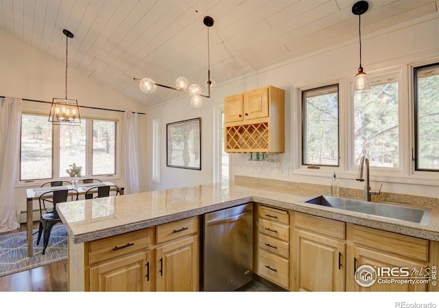 30795 W Ridge Rd, Buena Vista, CO 81211 - kitchen featuring dishwasher, light brown cabinetry, tile counters, a chandelier, and vaulted ceiling