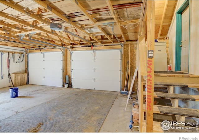 30795 W Ridge Rd, Buena Vista, CO 81211 - garage featuring a garage door opener