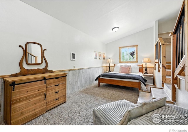 181 County Road 874, Tabernash, CO 80478 - carpeted bedroom with lofted ceiling and wainscoting