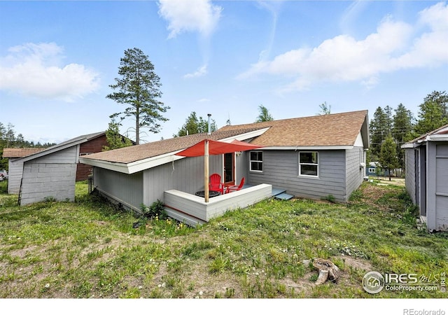 181 County Road 874, Tabernash, CO 80478 - rear view of property featuring roof with shingles