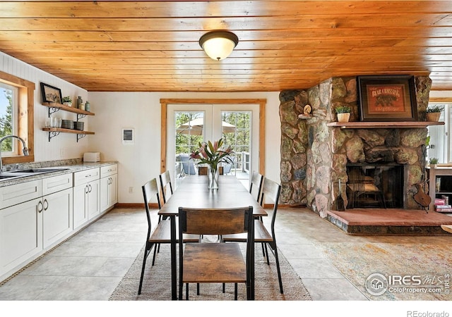 181 County Road 874, Tabernash, CO 80478 - dining area with wood ceiling and a fireplace
