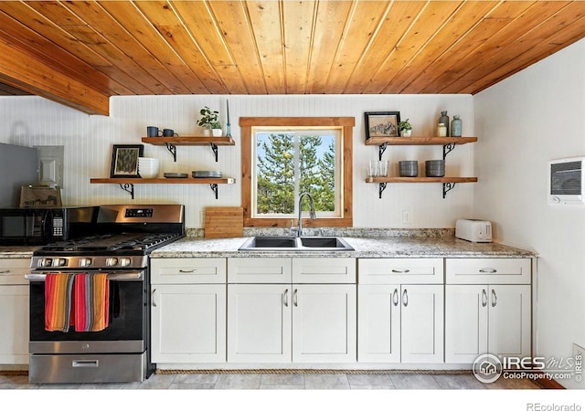 181 County Road 874, Tabernash, CO 80478 - kitchen featuring stainless steel range with gas stovetop, open shelves, wooden ceiling, black microwave, and light stone countertops