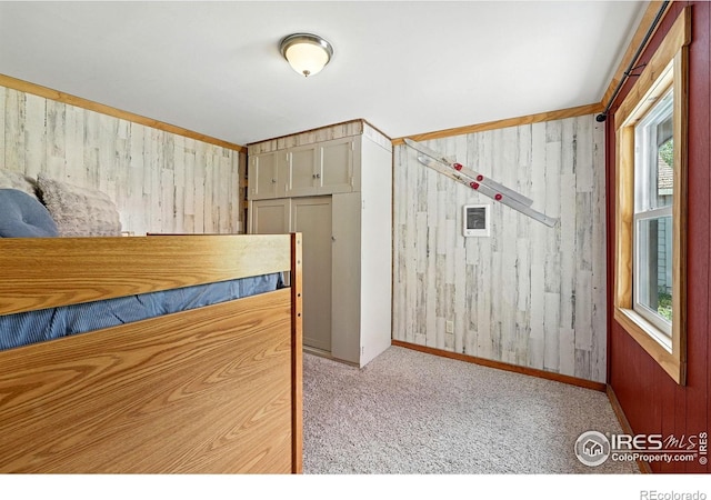 181 County Road 874, Tabernash, CO 80478 - unfurnished bedroom with wood walls and carpet
