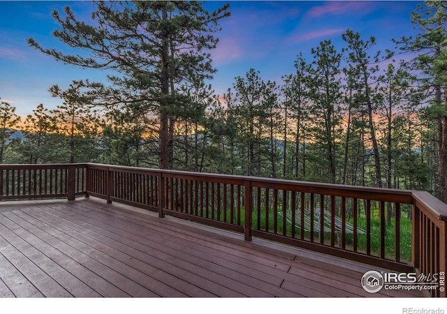 451 Newell Dr, Loveland, CO 80537 - view of deck at dusk