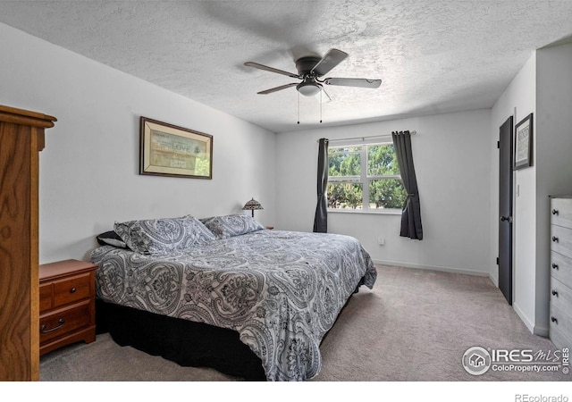 607 42nd Ave, Greeley, CO 80634 - carpeted bedroom with a textured ceiling and ceiling fan