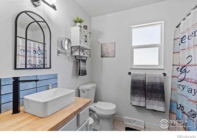 607 42nd Ave, Greeley, CO 80634 - full bathroom featuring toilet and vanity