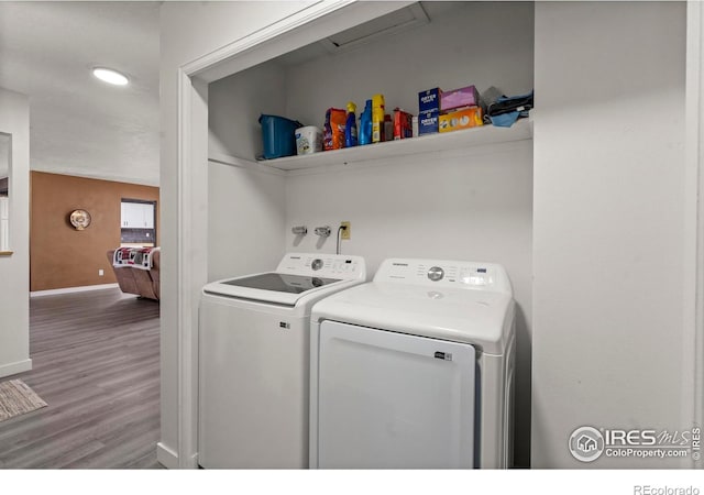 607 42nd Ave, Greeley, CO 80634 - laundry area with washer and dryer, wood finished floors, and recessed lighting