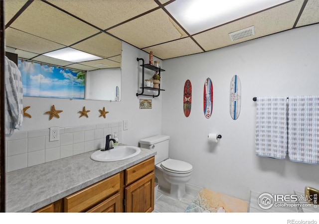 607 42nd Ave, Greeley, CO 80634 - bathroom with a paneled ceiling, backsplash, vanity, tile patterned floors, and curtained shower