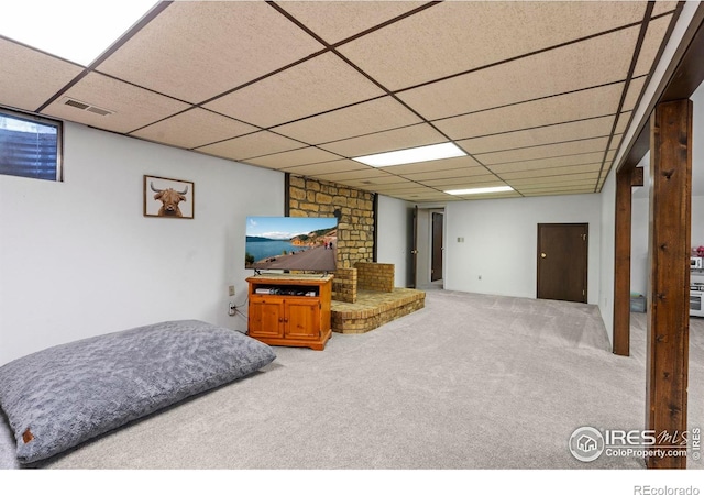 607 42nd Ave, Greeley, CO 80634 - finished below grade area featuring carpet flooring and a paneled ceiling