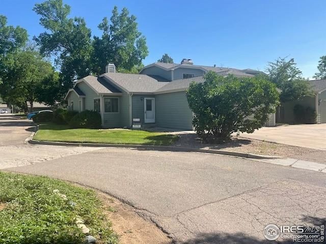 933 E Prospect Rd Unit A, Fort Collins, CO 80525 - ranch-style house with concrete driveway and a front lawn