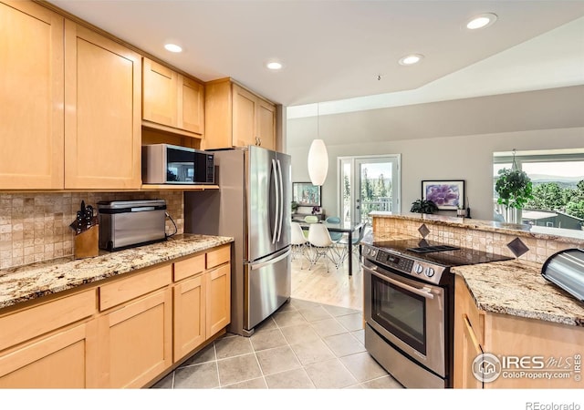 4815 Sugarloaf Rd, Boulder, CO 80302 - kitchen with appliances with stainless steel finishes, light brown cabinets, plenty of natural light, and recessed lighting