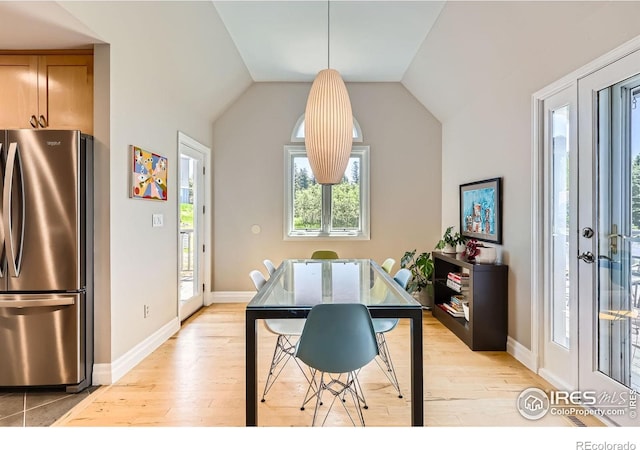 4815 Sugarloaf Rd, Boulder, CO 80302 - dining room with light wood-type flooring, plenty of natural light, and vaulted ceiling