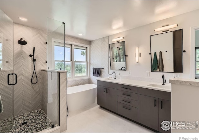 4815 Sugarloaf Rd, Boulder, CO 80302 - bathroom with a stall shower, a soaking tub, double vanity, and tile patterned floors