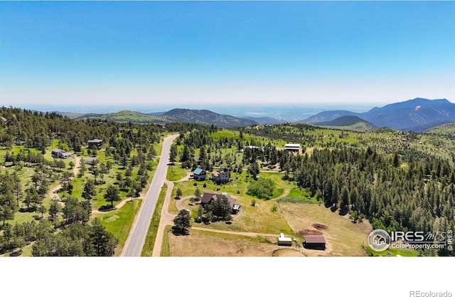 4815 Sugarloaf Rd, Boulder, CO 80302 - aerial view of a mountainous background and a heavily wooded area