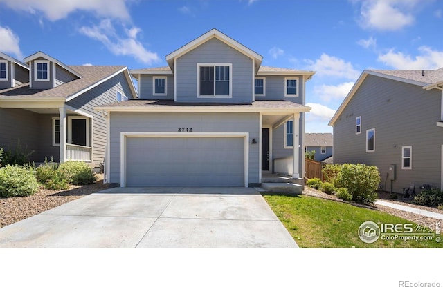 2742 Cooperland Blvd, Berthoud, CO 80513 - traditional-style home with concrete driveway and an attached garage