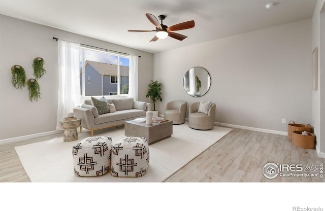 2742 Cooperland Blvd, Berthoud, CO 80513 - living area featuring ceiling fan and wood finished floors