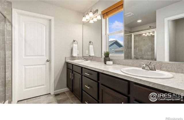 2742 Cooperland Blvd, Berthoud, CO 80513 - bathroom with double vanity and a shower stall