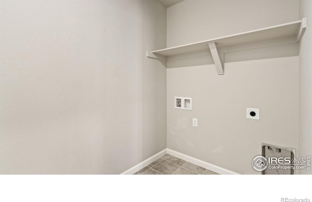 2742 Cooperland Blvd, Berthoud, CO 80513 - washroom with hookup for a washing machine, tile patterned flooring, and electric dryer hookup