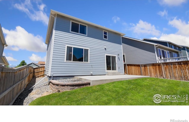 2742 Cooperland Blvd, Berthoud, CO 80513 - back of property featuring a patio and a fenced backyard