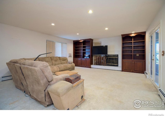 7035 S Boulder Rd, Boulder, CO 80303 - carpeted living room with a baseboard heating unit, recessed lighting, and a glass covered fireplace
