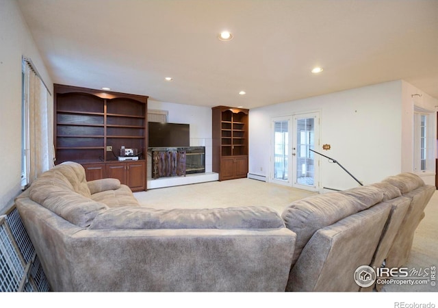 7035 S Boulder Rd, Boulder, CO 80303 - living area with baseboard heating, carpet flooring, a glass covered fireplace, recessed lighting, and french doors