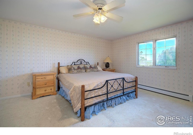 7035 S Boulder Rd, Boulder, CO 80303 - bedroom featuring a baseboard radiator, carpet floors, and a ceiling fan