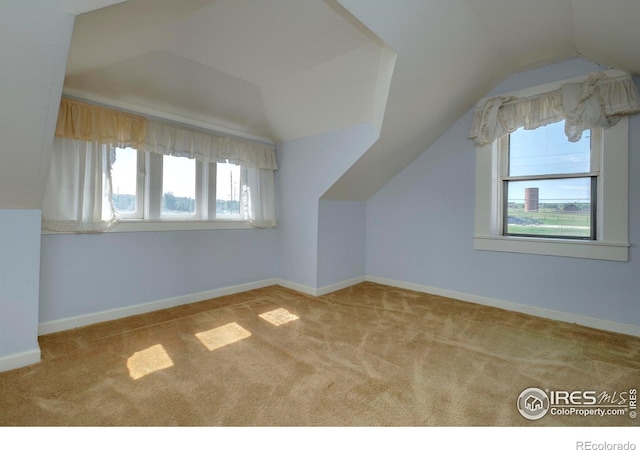 7035 S Boulder Rd, Boulder, CO 80303 - bonus room with healthy amount of natural light, lofted ceiling, and carpet