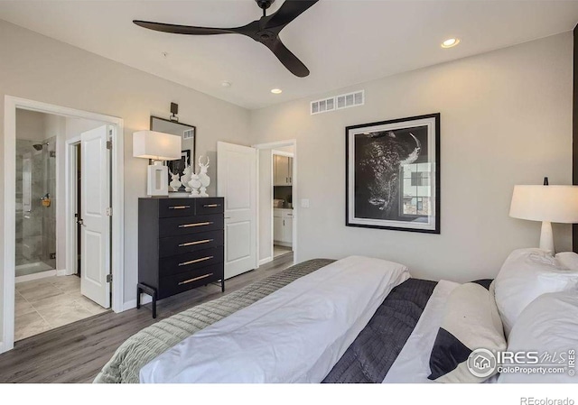 921 Abbott Ln, Fort Collins, CO 80524 - bedroom featuring wood finished floors, recessed lighting, ensuite bath, and a ceiling fan