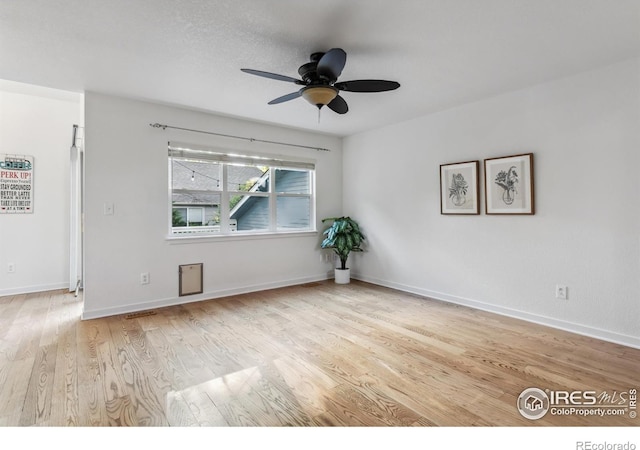 1993 S Fork Dr, Lafayette, CO 80026 - empty room with a ceiling fan and wood finished floors