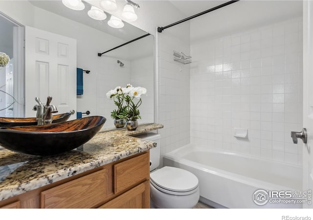 1993 S Fork Dr, Lafayette, CO 80026 - bathroom with vanity and shower / bath combination