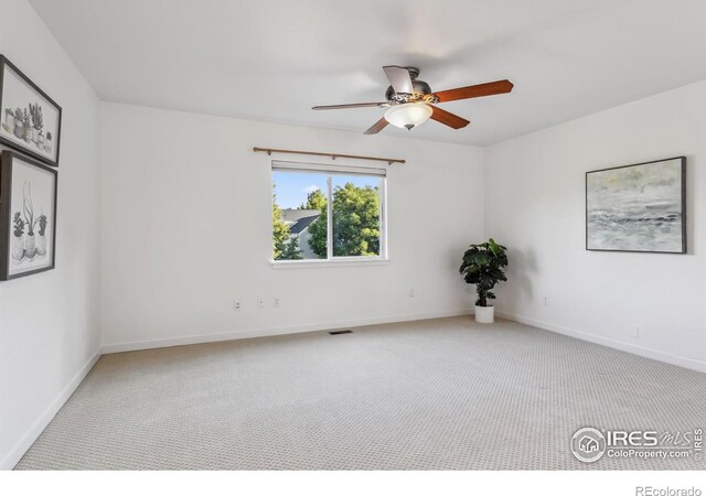 1993 S Fork Dr, Lafayette, CO 80026 - carpeted spare room with a ceiling fan and baseboards