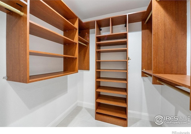 388 Fairfield Ln, Louisville, CO 80027 - walk in closet with light tile patterned floors