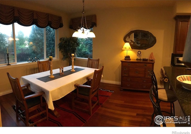 1402 Westfield Dr, Fort Collins, CO 80526 - dining space with dark wood-style flooring and healthy amount of natural light