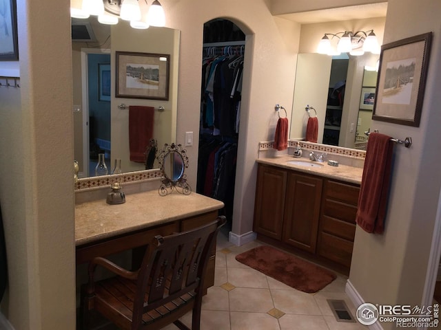 1402 Westfield Dr, Fort Collins, CO 80526 - full bath featuring tile patterned flooring, vanity, and a walk in closet