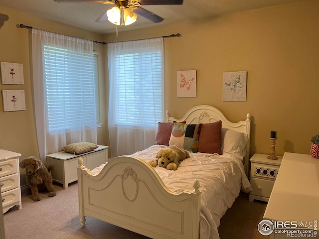 1402 Westfield Dr, Fort Collins, CO 80526 - bedroom with light carpet and ceiling fan