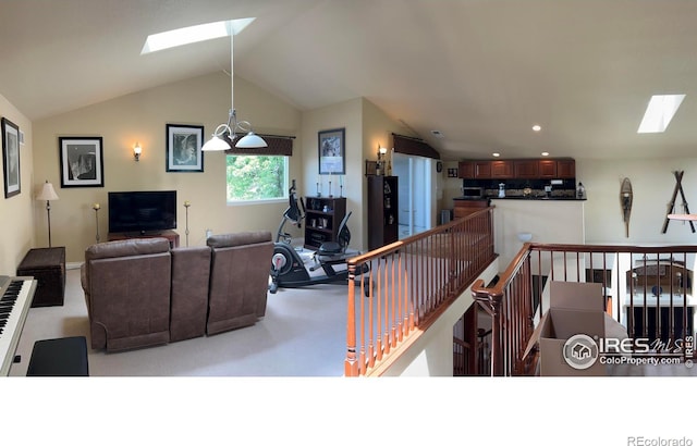 1402 Westfield Dr, Fort Collins, CO 80526 - living area with a skylight, light colored carpet, recessed lighting, and vaulted ceiling