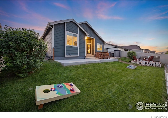 660 Cimarron Trl, Ault, CO 80610 - back of house with a patio area