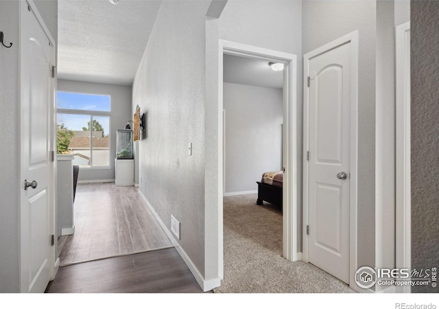 660 Cimarron Trl, Ault, CO 80610 - corridor with baseboards and wood finished floors