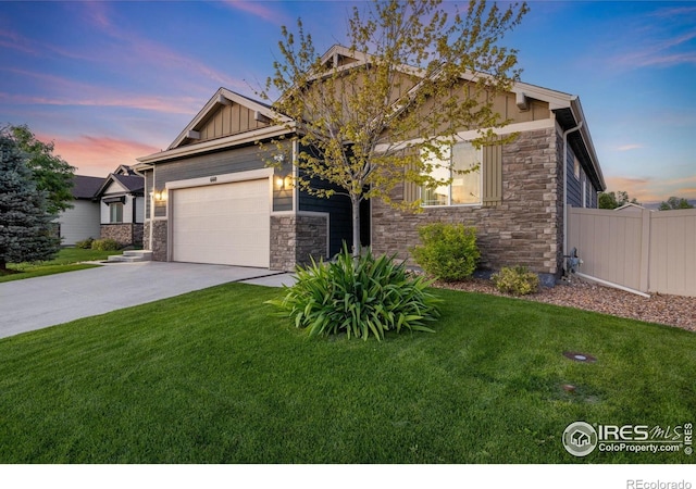 660 Cimarron Trl, Ault, CO 80610 - craftsman house featuring stone siding, a garage, concrete driveway, and board and batten siding