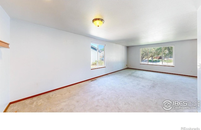 2027 Churchill Ct, Fort Collins, CO 80526 - spare room featuring carpet and baseboards