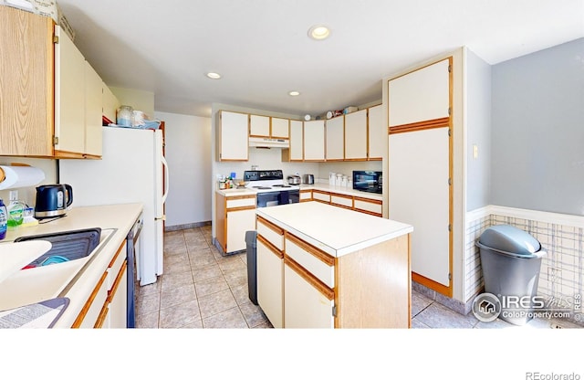 2027 Churchill Ct, Fort Collins, CO 80526 - kitchen featuring range with electric stovetop, under cabinet range hood, light countertops, black microwave, and light tile patterned floors