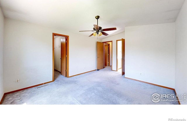 2027 Churchill Ct, Fort Collins, CO 80526 - carpeted spare room featuring baseboards and a ceiling fan