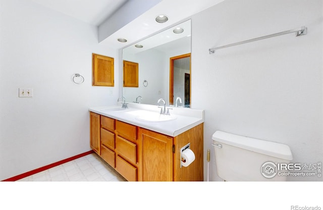 2027 Churchill Ct, Fort Collins, CO 80526 - full bathroom with tile patterned floors, double vanity, and recessed lighting