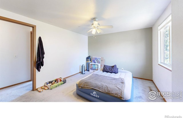 2027 Churchill Ct, Fort Collins, CO 80526 - carpeted bedroom with baseboards and a ceiling fan