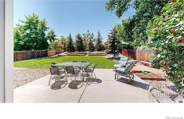 2027 Churchill Ct, Fort Collins, CO 80526 - fenced backyard with a patio area and outdoor dining area