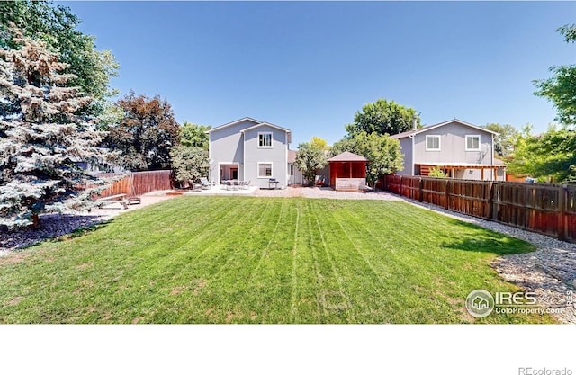 2027 Churchill Ct, Fort Collins, CO 80526 - fenced backyard featuring a patio area