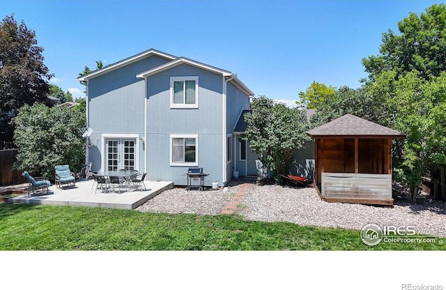 2027 Churchill Ct, Fort Collins, CO 80526 - rear view of house featuring a patio area, french doors, a sunroom, and a yard