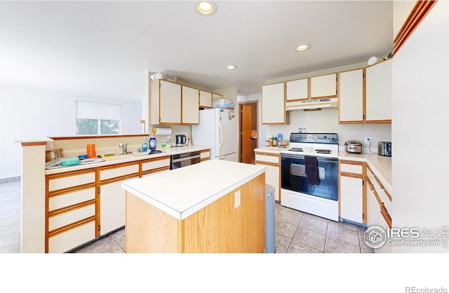 2027 Churchill Ct, Fort Collins, CO 80526 - kitchen with white appliances, under cabinet range hood, light countertops, recessed lighting, and a kitchen island