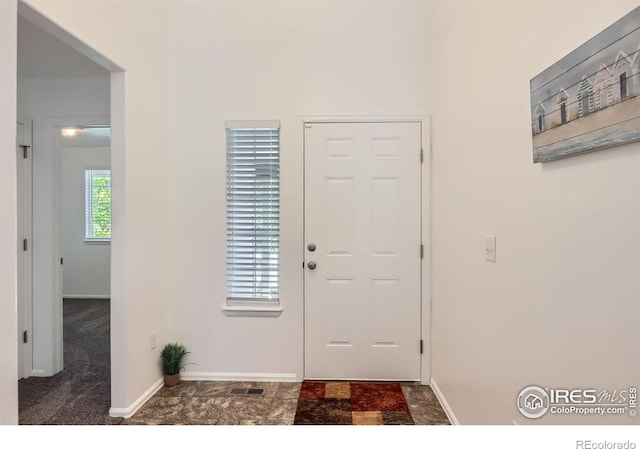 2244 Woodbury Ln, Fort Collins, CO 80524 - foyer entrance featuring baseboards