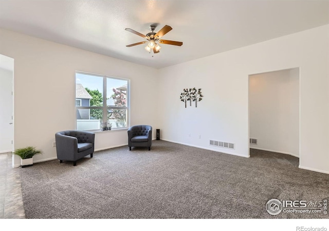 2244 Woodbury Ln, Fort Collins, CO 80524 - sitting room with ceiling fan and carpet flooring